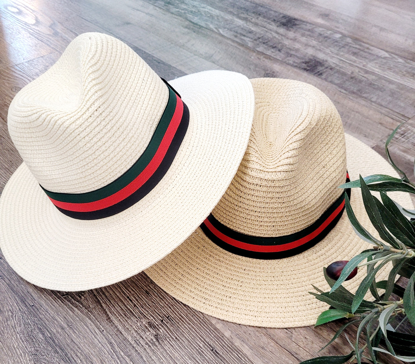 red, green, and black straw hat